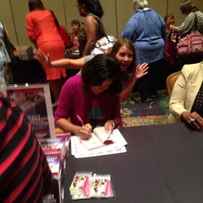 My first photo-bomb ever by author Sally Kilpatrick at the Harlequin book signing. I was sitting next to Brenda Jackson. I promise I didn't scream until afterwards!